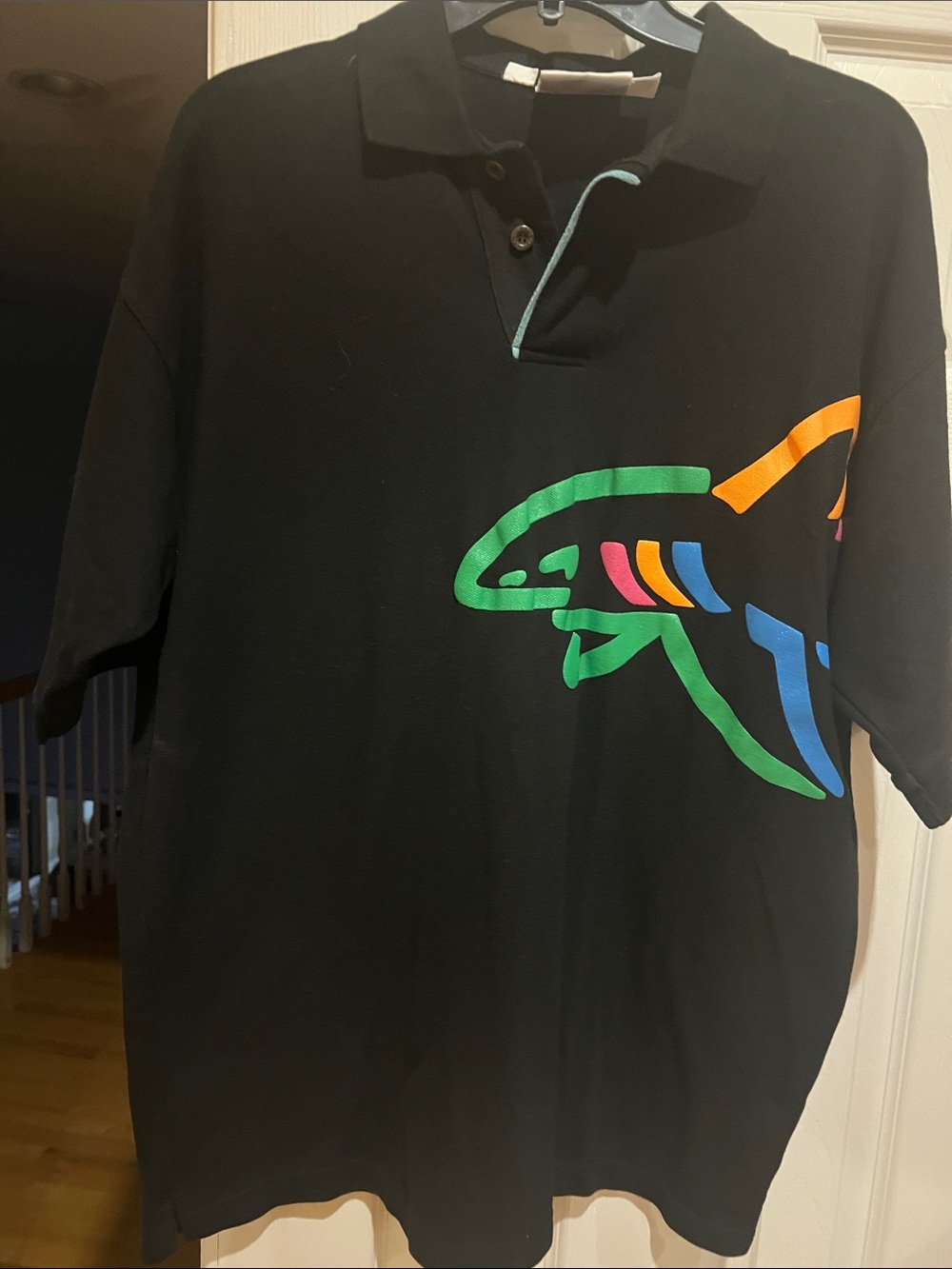 Greg Norman Collection Black Polo with Multicolor Shark Graphic